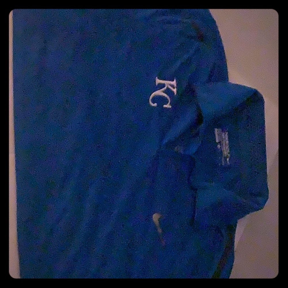 Nike Gold Royals polo